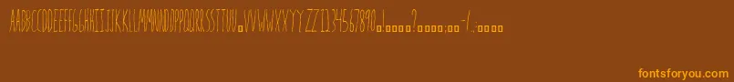 Mrs.Strange-Schriftart – Orangefarbene Schriften auf braunem Hintergrund