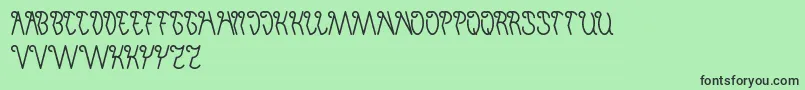 フォントInvisibleMan – 緑の背景に黒い文字