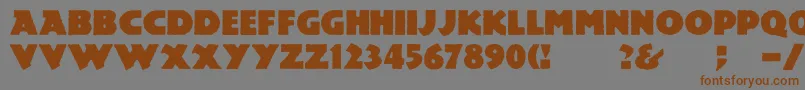 フォントMesozoic – 茶色の文字が灰色の背景にあります。