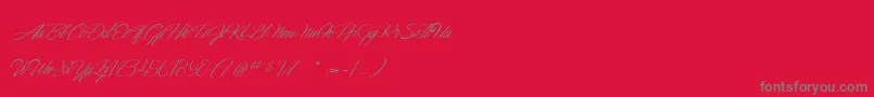 DancingInTheMoonlight Font – Gray Fonts on Red Background