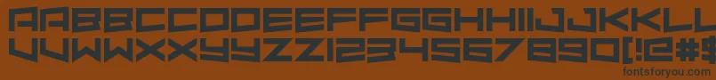 AlmondRocks-fontti – mustat fontit ruskealla taustalla