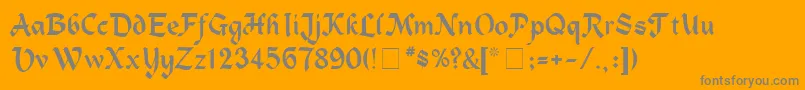 AlpineMedium-Schriftart – Graue Schriften auf orangefarbenem Hintergrund