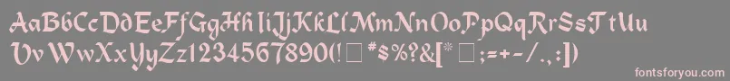 フォントAlpineMedium – 灰色の背景にピンクのフォント