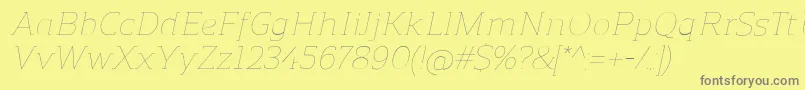 ReganslabUltralightitalic Font – Gray Fonts on Yellow Background