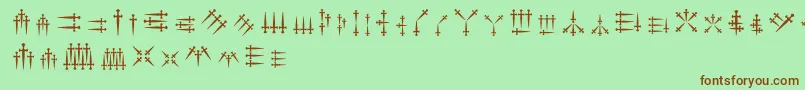 Daggersalphabet Font – Brown Fonts on Green Background