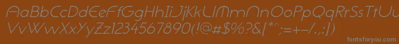 NeogothisadfstdLightoblique-fontti – harmaat kirjasimet ruskealla taustalla