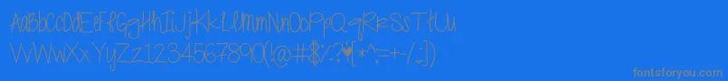 PrissyDramatic-Schriftart – Graue Schriften auf blauem Hintergrund