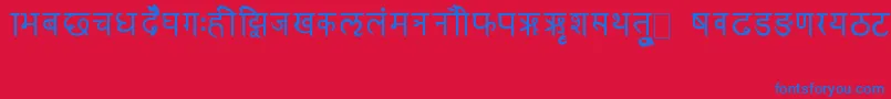 RkSanskrit-Schriftart – Blaue Schriften auf rotem Hintergrund