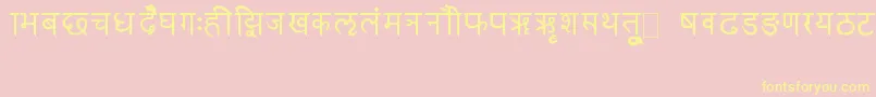 Czcionka RkSanskrit – żółte czcionki na różowym tle