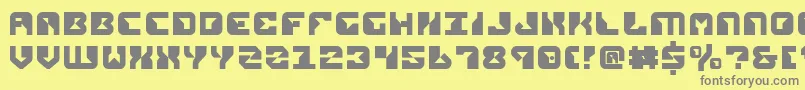 Repv2-fontti – harmaat kirjasimet keltaisella taustalla