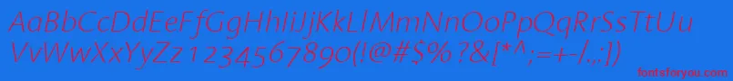 LinotypeAromaExtralightItalic Font – Red Fonts on Blue Background