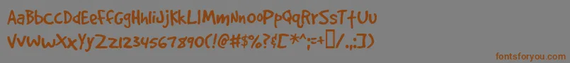 Gooddogplain Font – Brown Fonts on Gray Background