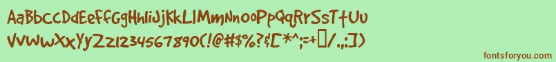 Gooddogplain Font – Brown Fonts on Green Background