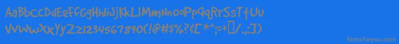 フォントGooddogplain – 青い背景に灰色の文字