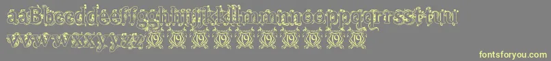 BeauregardHollow Font – Yellow Fonts on Gray Background