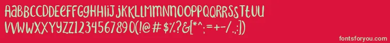 SakraRegular Font – Green Fonts on Red Background