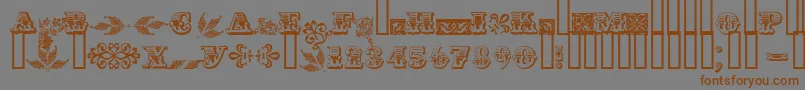 Asylbekm05.Kz-fontti – ruskeat fontit harmaalla taustalla
