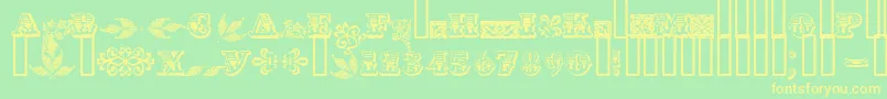 フォントAsylbekm05.Kz – 黄色の文字が緑の背景にあります