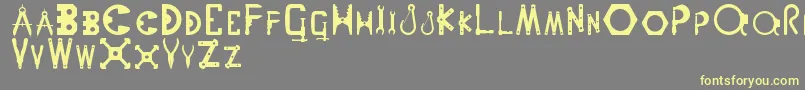 Nutsnbolts Font – Yellow Fonts on Gray Background