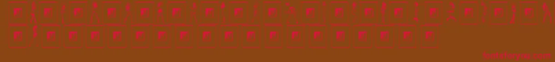 CutiesByCarlos Font – Red Fonts on Brown Background
