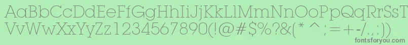 LubalinGraphExtraLightBt Font – Gray Fonts on Green Background