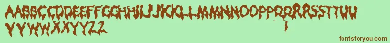 フォントDroop – 緑の背景に茶色のフォント