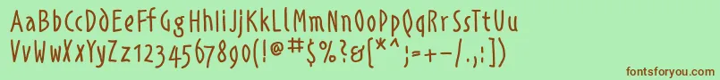フォントAlphabetismhand – 緑の背景に茶色のフォント