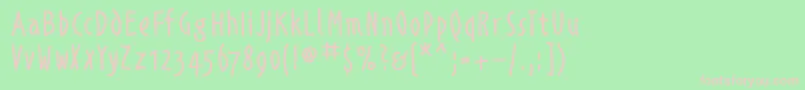 Alphabetismhand-Schriftart – Rosa Schriften auf grünem Hintergrund