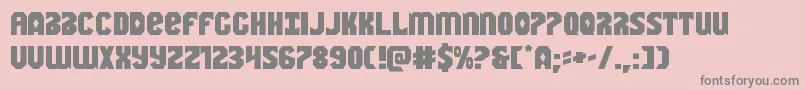 Warnationexpand-fontti – harmaat kirjasimet vaaleanpunaisella taustalla