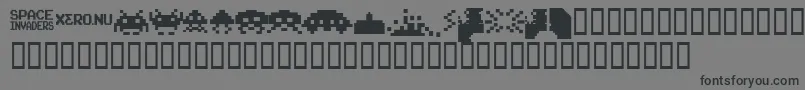 Подробнее о шрифте InvadersFromSpace Шрифт InvadersFromSpace – чёрные шрифты на сером фоне