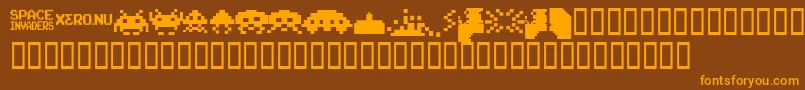 Fonte InvadersFromSpace – fontes laranjas em um fundo marrom