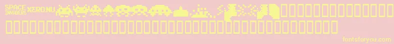 Fonte InvadersFromSpace – fontes amarelas em um fundo rosa