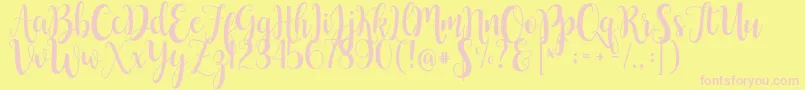 ButtercupSample-Schriftart – Rosa Schriften auf gelbem Hintergrund