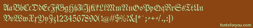 フォントNeuetheuerdankfrakturunz1a – 緑色の文字が茶色の背景にあります。