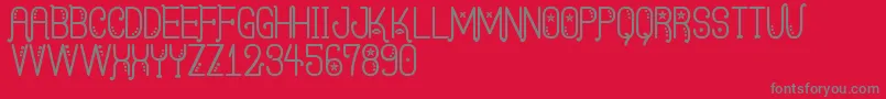 KasquiwaneSt Font – Gray Fonts on Red Background
