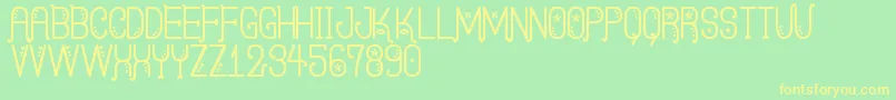KasquiwaneSt Font – Yellow Fonts on Green Background