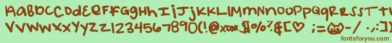 Elizacat Font – Brown Fonts on Green Background