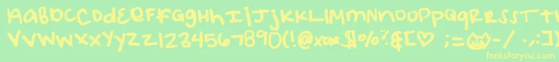 Elizacat Font – Yellow Fonts on Green Background