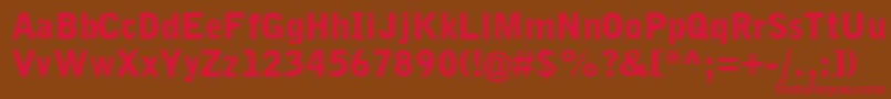 フォントGrotesquemtstdBlack – 赤い文字が茶色の背景にあります。