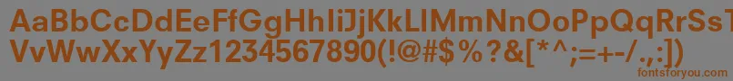 フォントParallaxSsiBold – 茶色の文字が灰色の背景にあります。