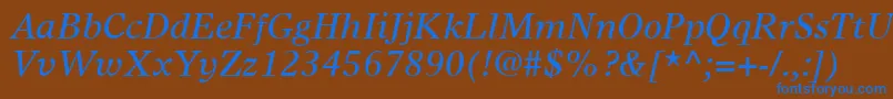 TimesEuropaLtItalic-Schriftart – Blaue Schriften auf braunem Hintergrund