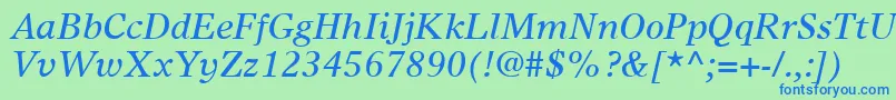TimesEuropaLtItalic-Schriftart – Blaue Schriften auf grünem Hintergrund