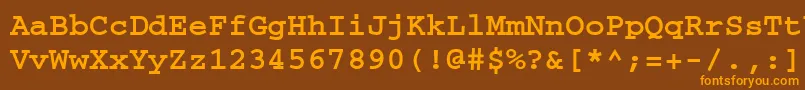 フォントCourierttBold – オレンジ色の文字が茶色の背景にあります。