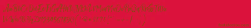 Fonte SmithenScript – fontes marrons em um fundo vermelho