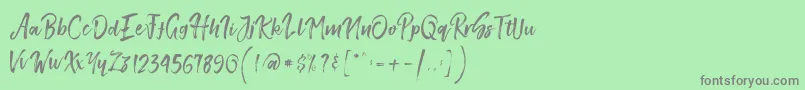 フォントSmithenScript – 緑の背景に灰色の文字