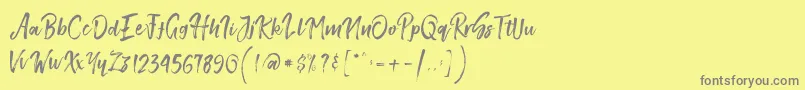 SmithenScript Font – Gray Fonts on Yellow Background