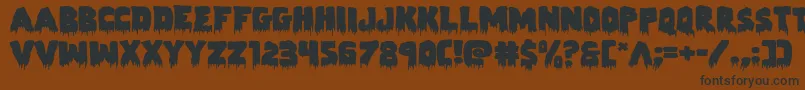 Zombiecontrolexpand-Schriftart – Schwarze Schriften auf braunem Hintergrund