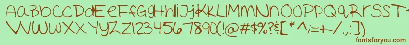 Ashleymarie Font – Brown Fonts on Green Background