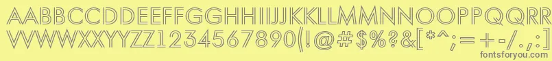 フォントAFuturaortotitulinln – 黄色の背景に灰色の文字