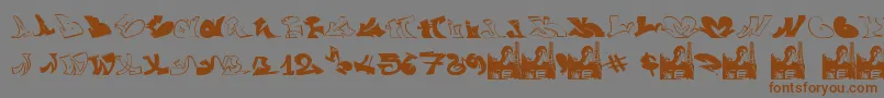 フォントGraffiiWassimo – 茶色の文字が灰色の背景にあります。